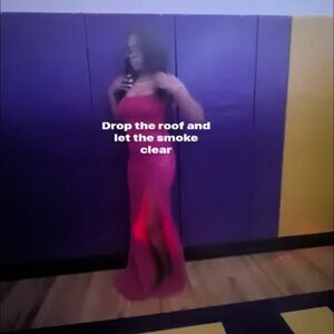 A pink dress with designs on it from “Windsor”